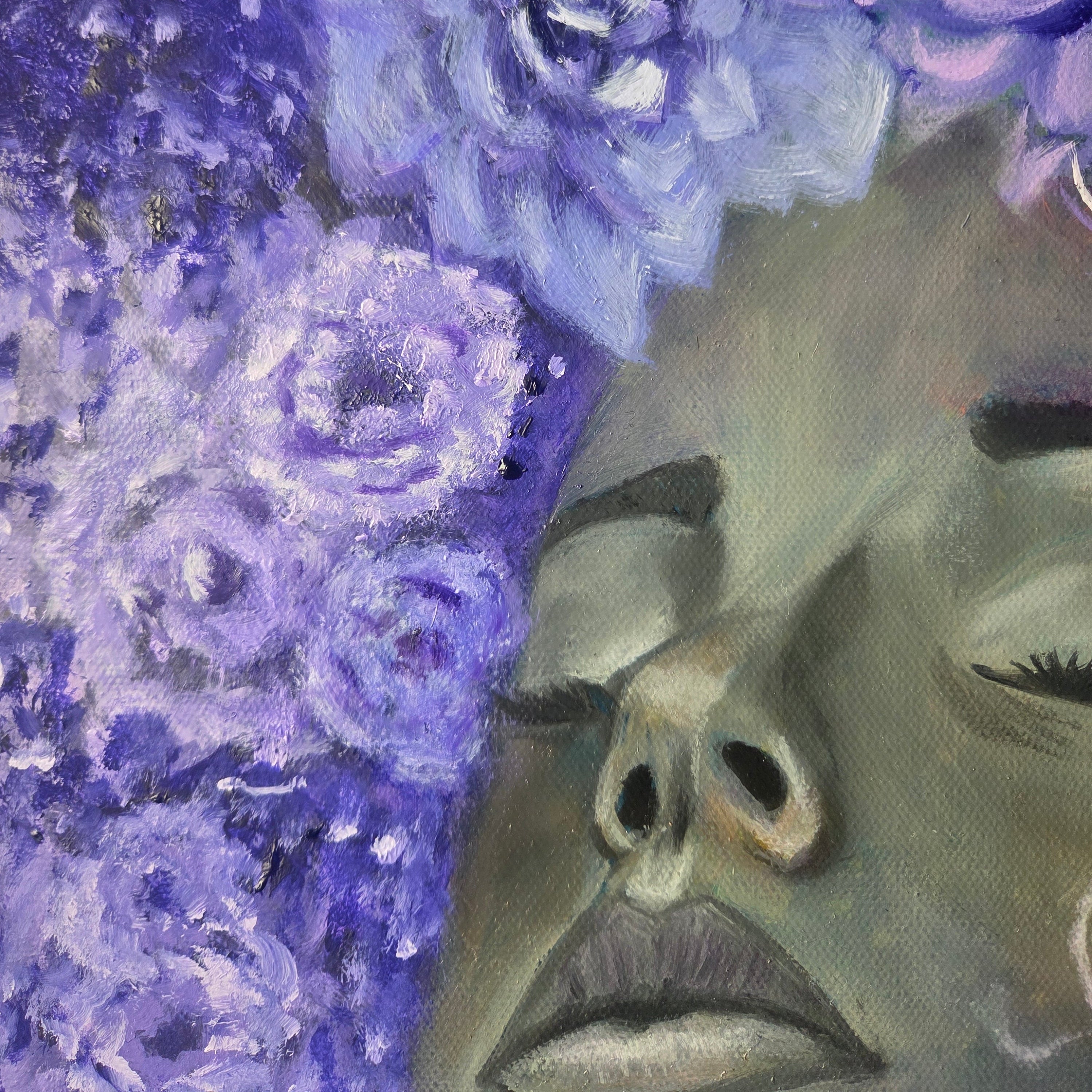 An expressive painting of a woman's face in profile with closed eyes, surrounded by large lavender and purple flowers against a textured purple background.