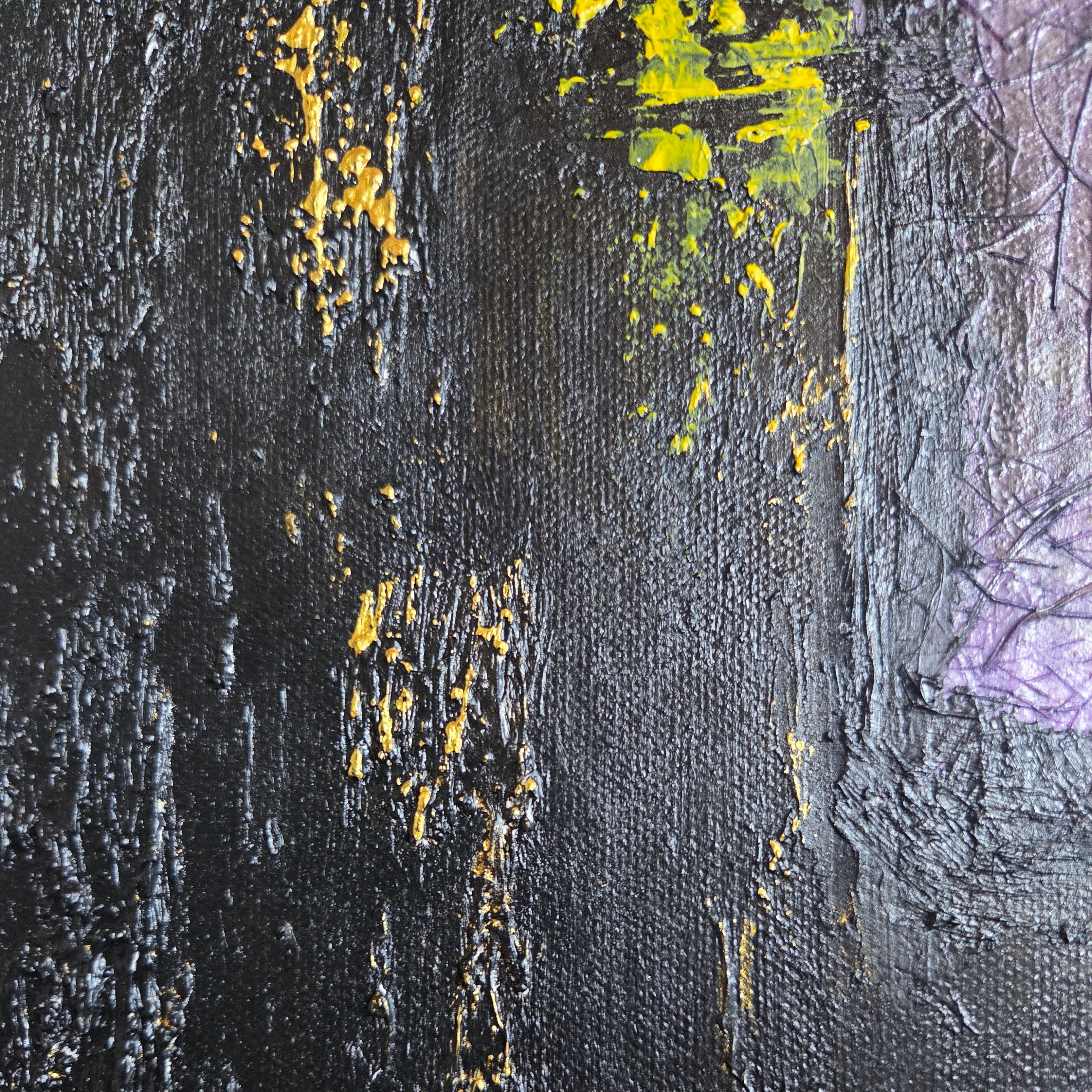 Abstract art with black and yellow textures on a textured surface