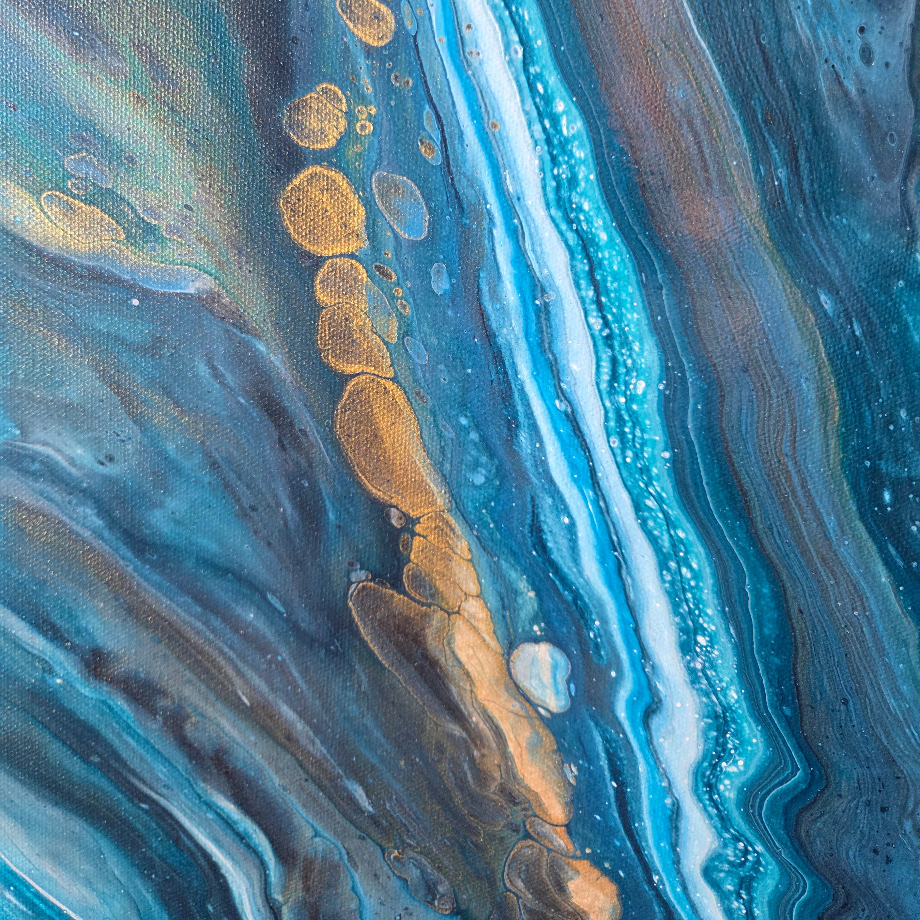 Close-up of a surface with blue and gold colors