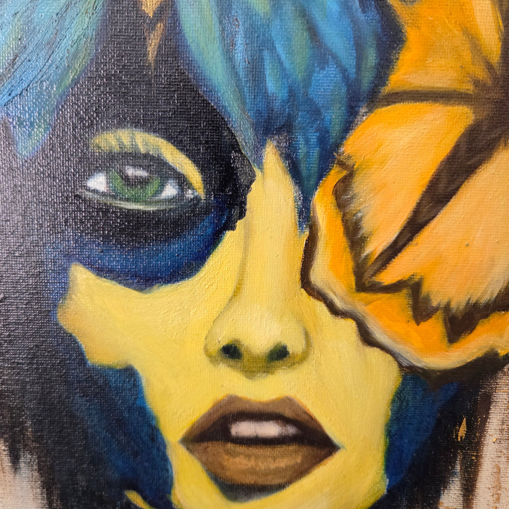 Close-up of a stylized face with yellow and blue colors