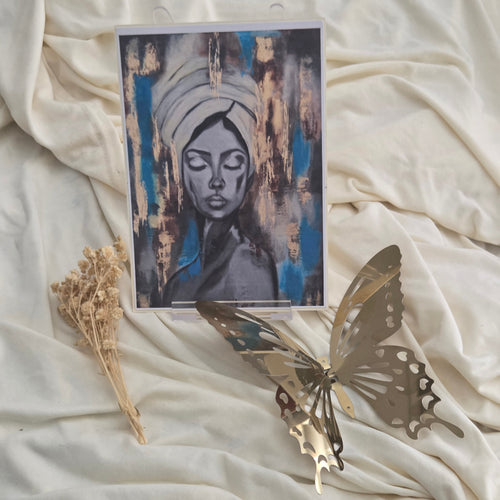 Artistic card with a stylized face with blues and golds in the background.