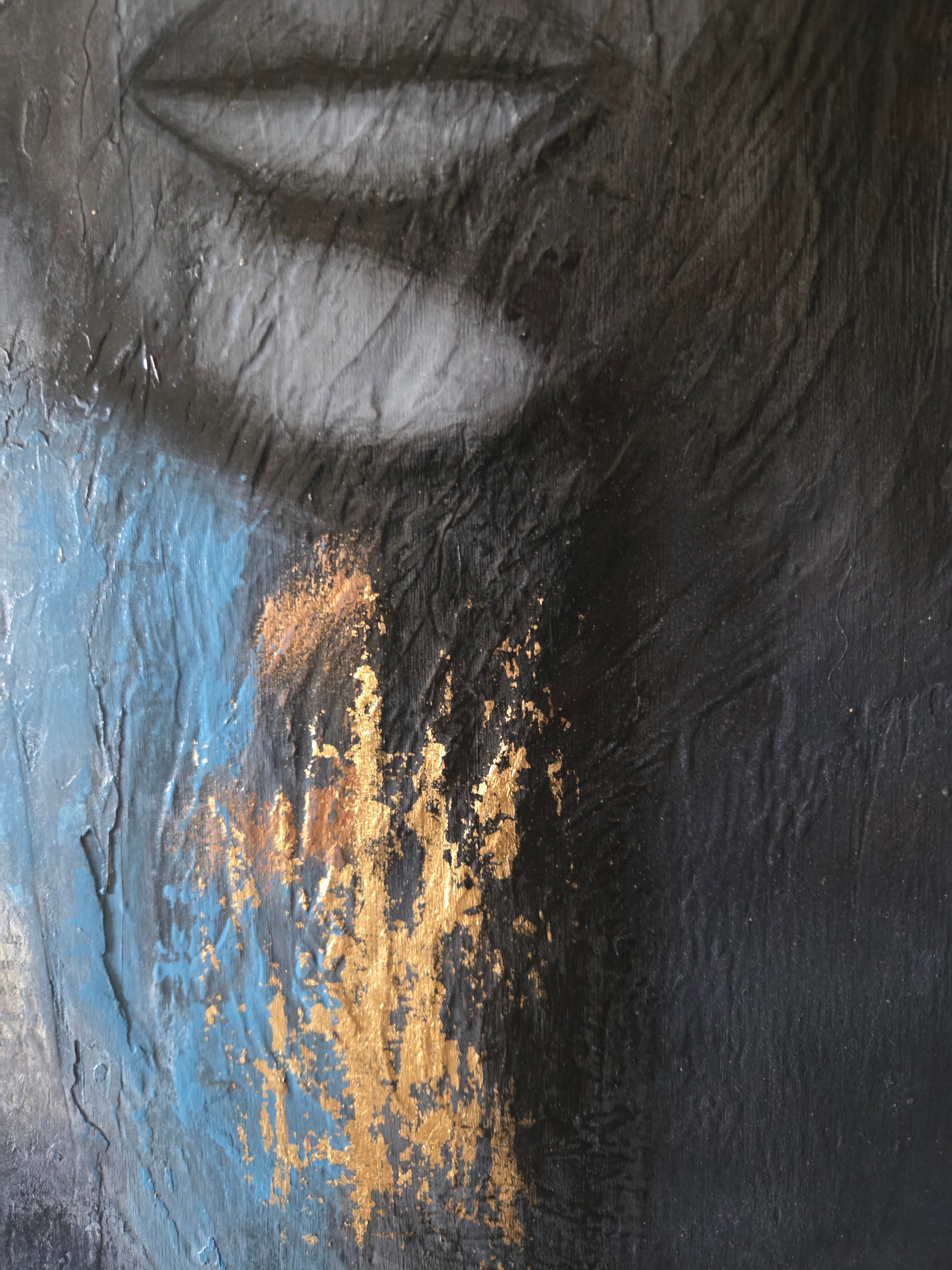 Close-up of a textured part of a face on a black and blue background with gold accents. 