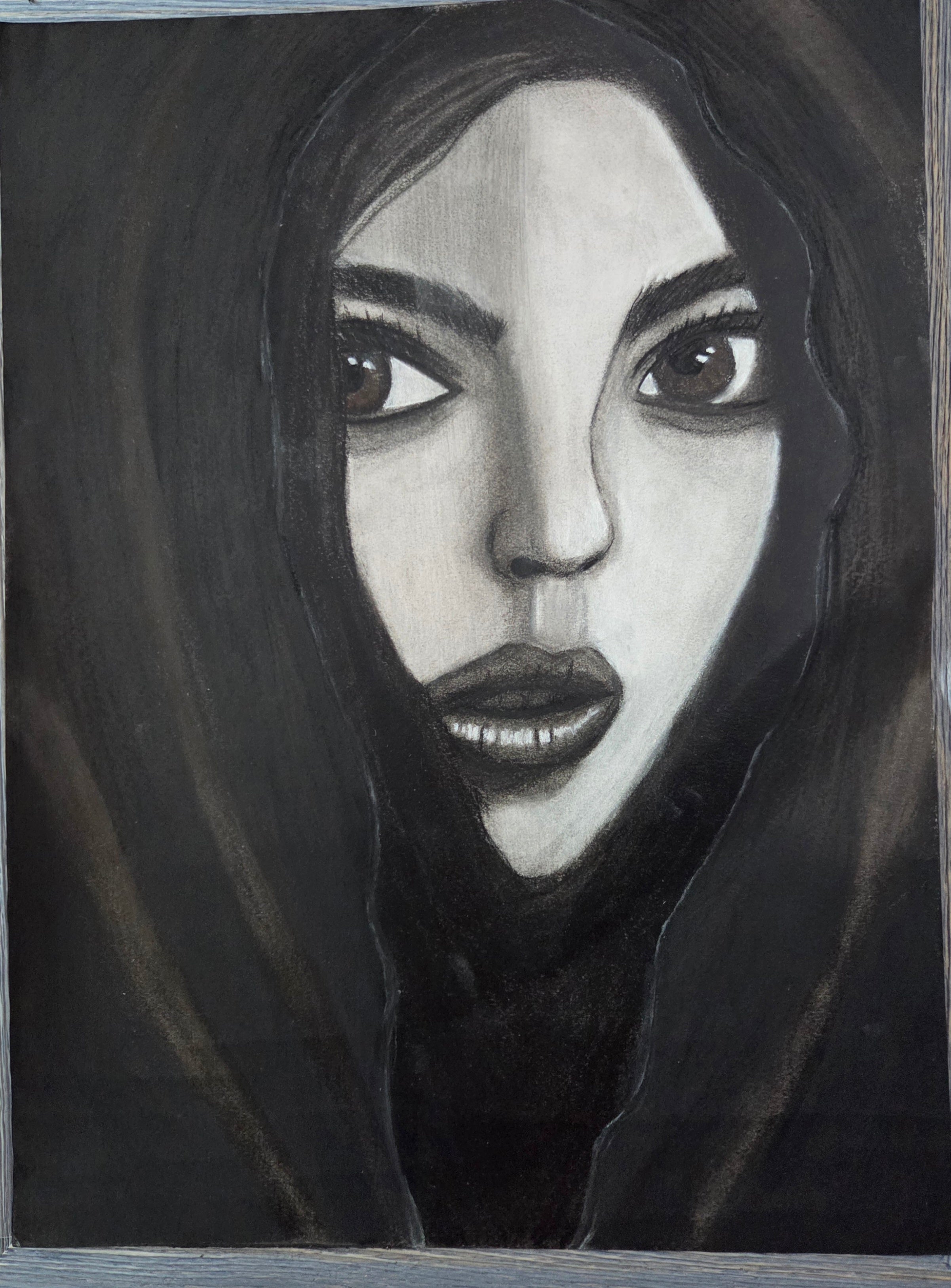 The woman in the black shawl