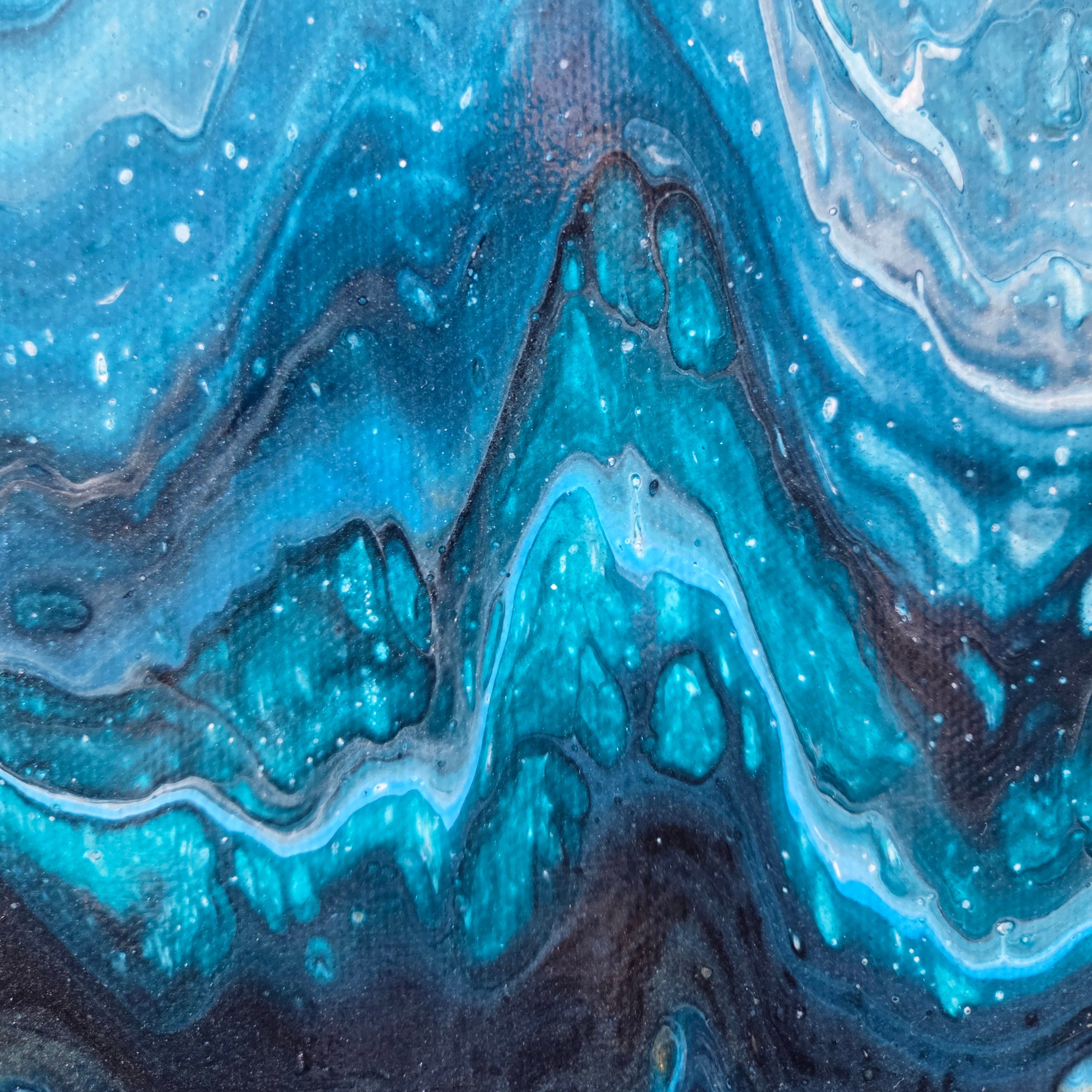 Shades of blue on a marbled pattern.